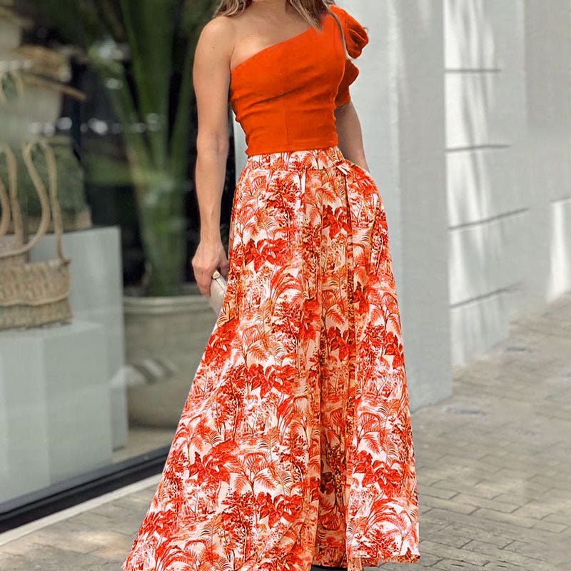 DFD4A059-827A-A39A-8F69-ED5D37028A19.jpg One Shoulder Cropped Top Floral Skirt Two-piece Set - Image 1